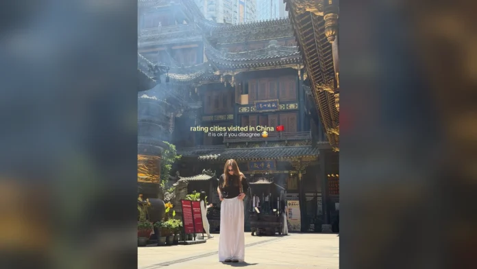 china-city-route-beijing-shanghai-hunan-cover-01-1600x900-1 Traditional Chinese architecture and a traveller in a sunlit Chongqing street
